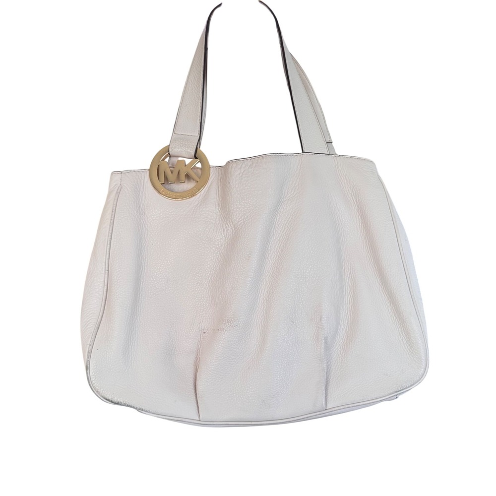 Michael Kors cream colored‎ Leather Tote Handbag 
Pre loved 15x11x5"